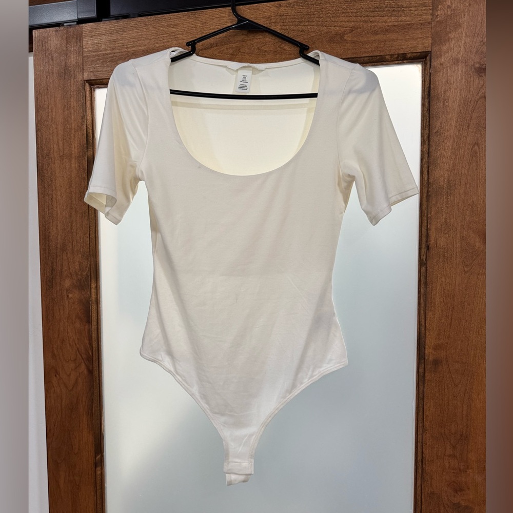 Cream short sleeved bodysuit H&M size small